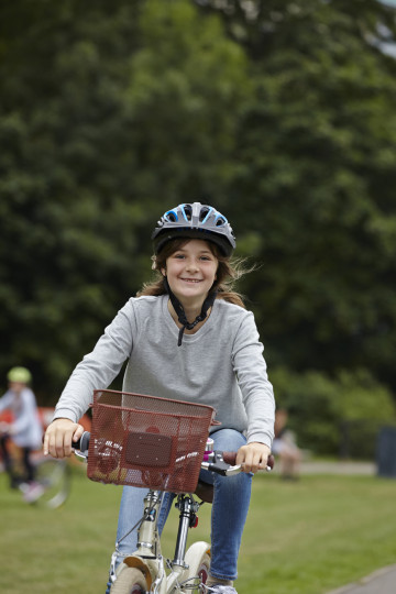 Girl enjoying cycle ride